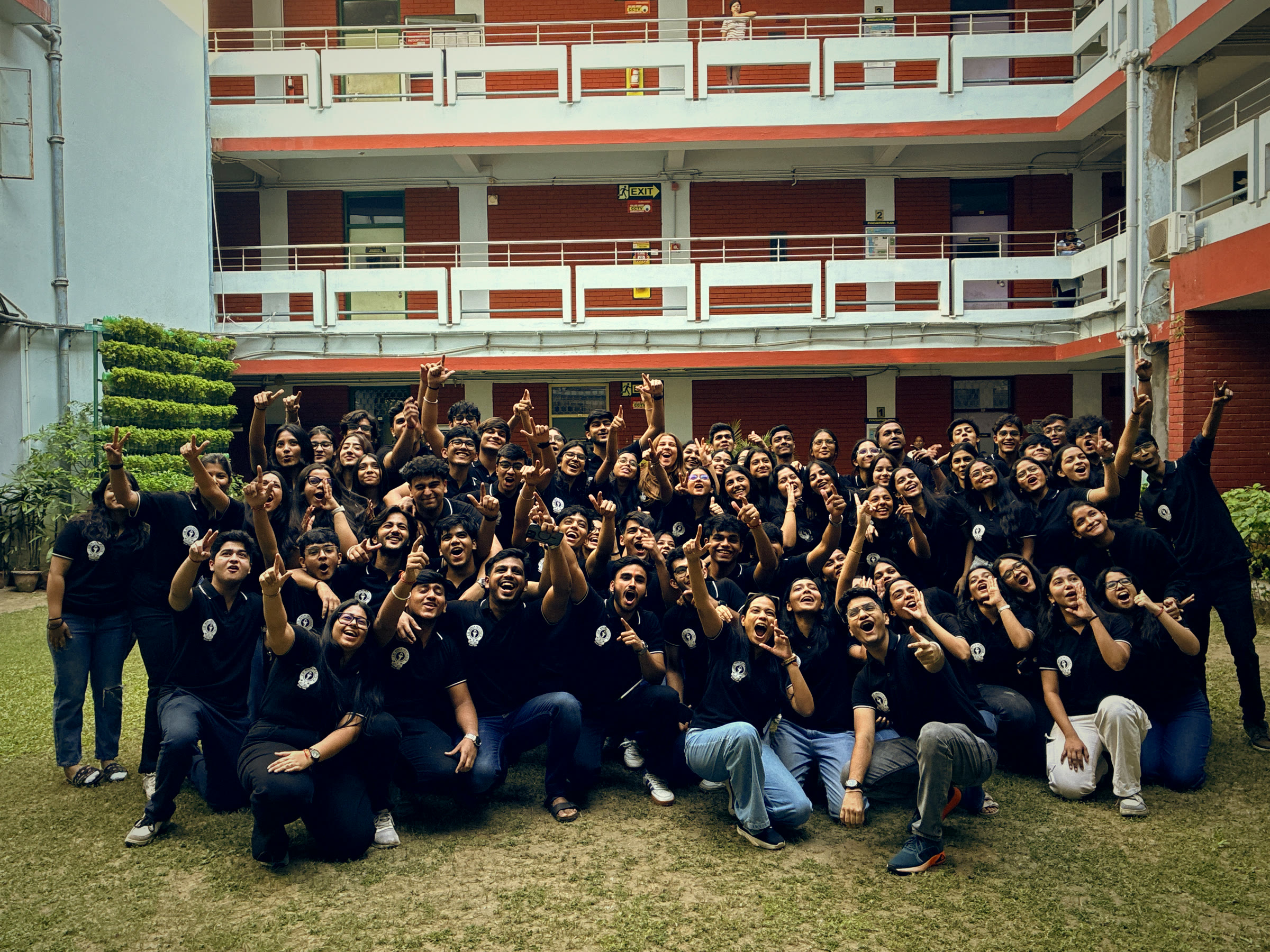 JDBI Business Club members celebrating together on campus
